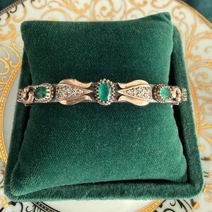 Elegant Silver and Green Bracelet